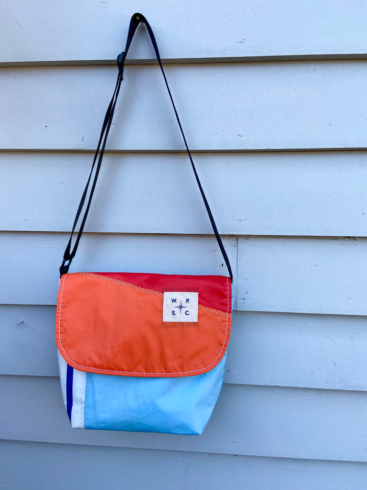 Atlas cross body bag in Orange and Blue