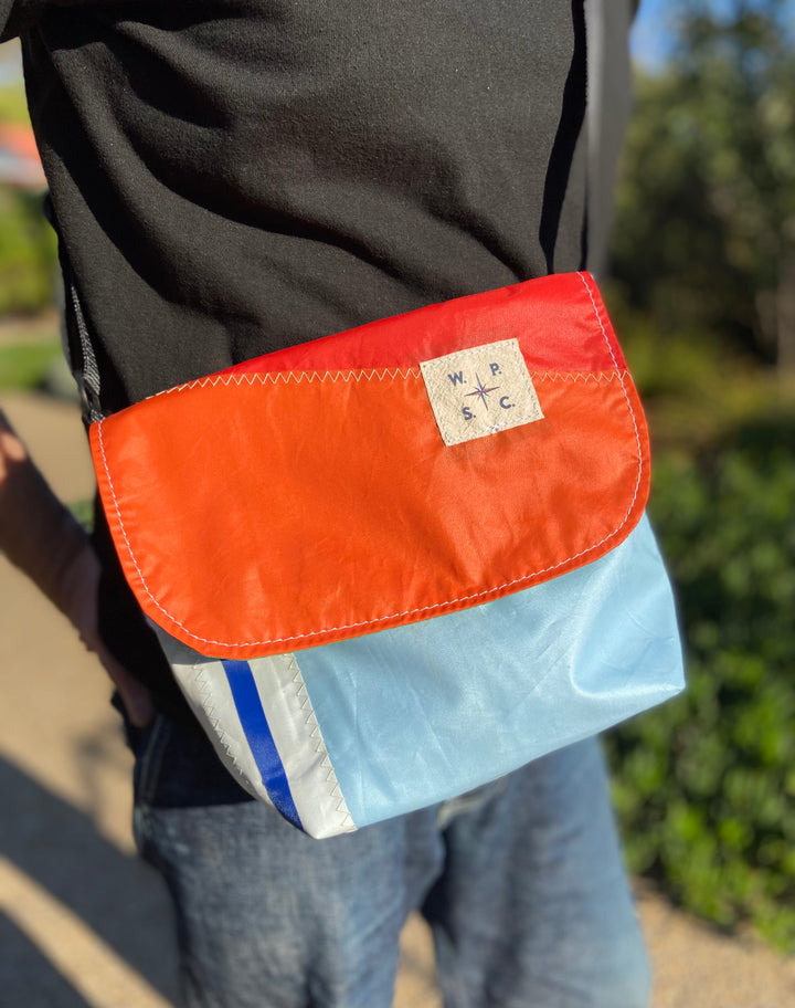 Atlas cross body bag in Orange and Blue