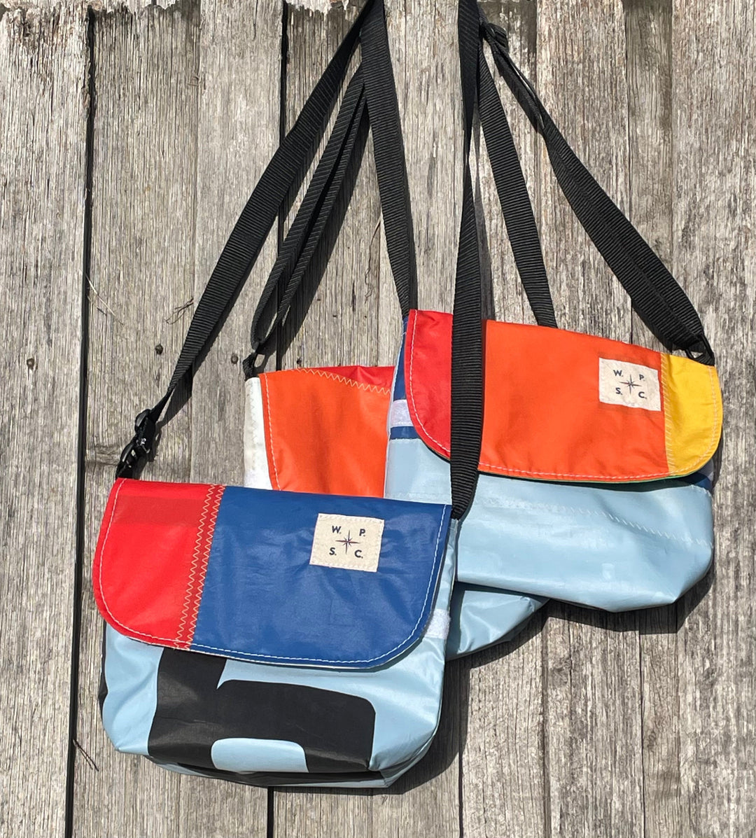 Atlas cross body bag in Orange and Blue