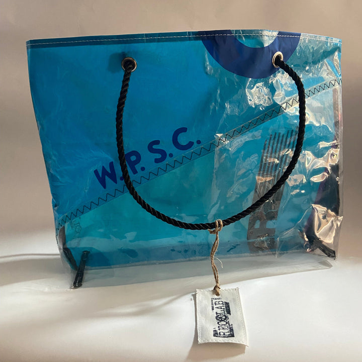 Trade Winds Tote / Teal blue with hot pink stripe and a clear panel