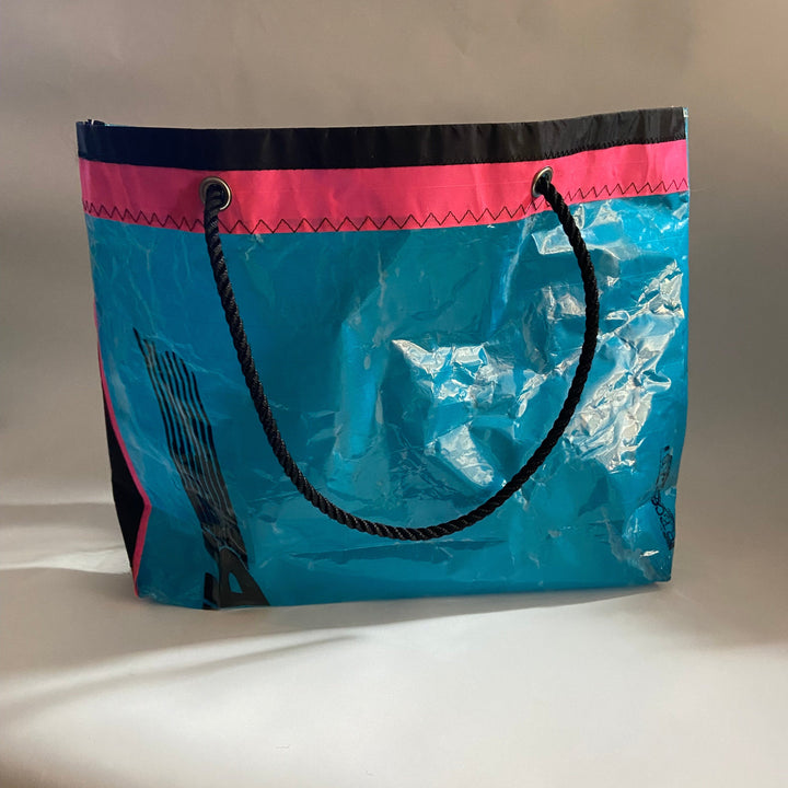 Trade Winds Tote / Teal blue with hot pink stripe and a clear panel