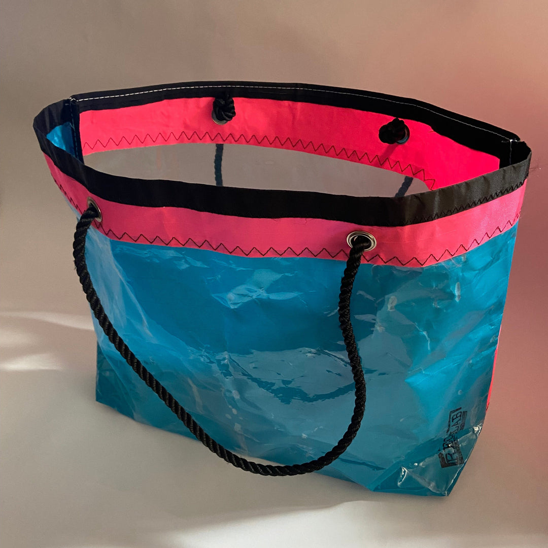 Trade Winds Tote in Hot Pink and Teal blue with clear panel